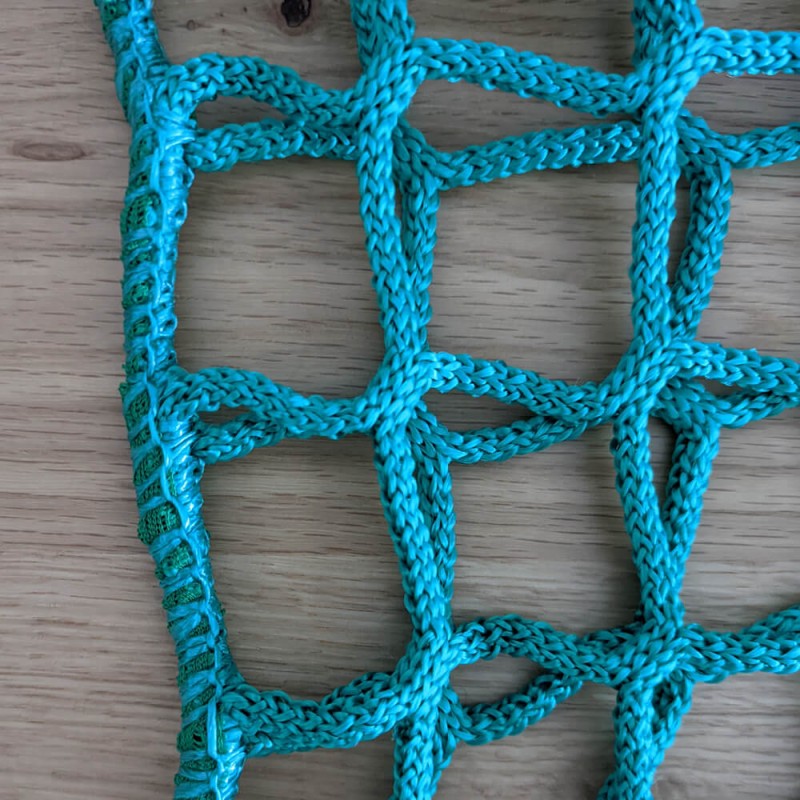 Crochet pour filet à foin