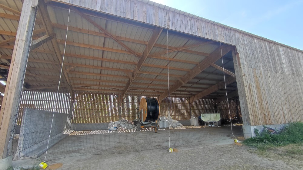 Filet de volière en rideau pour fermeture de hangar