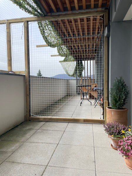 Réalisation d’un catio avec porte coulissante en filet