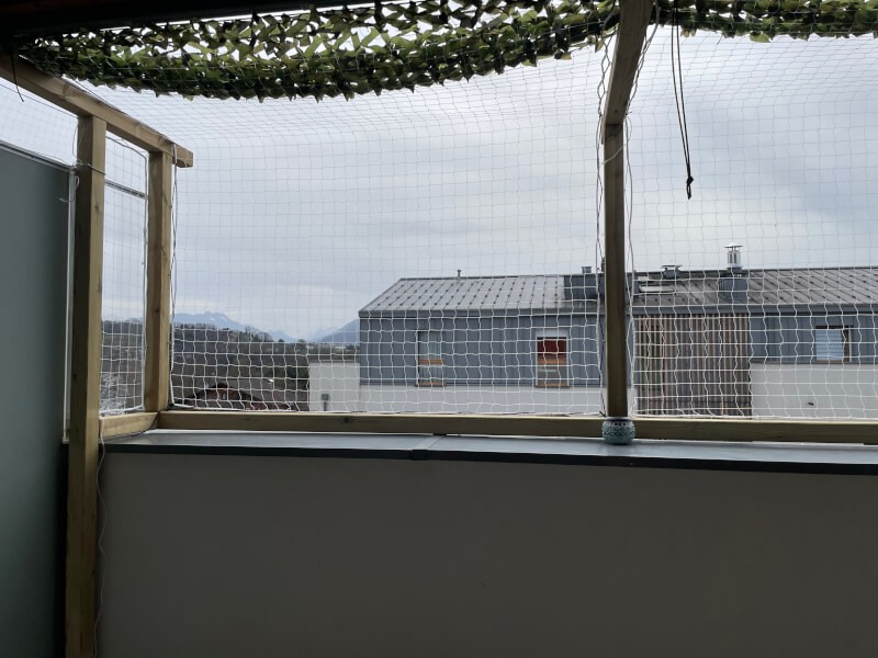 Réalisation d’un catio avec porte coulissante avec filet protection