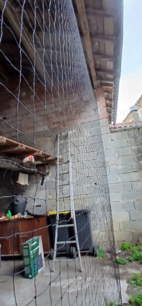 Filet anti-pigeon sur mesure pour bâtiment ouvert