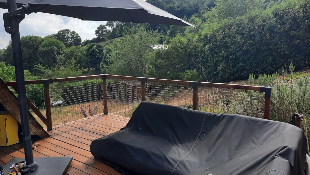 Filet de protection pour garde corps bois en hauteur